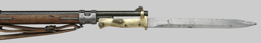 Image of German Brass-hilted ersatz bayonet mounted to Gewehr 98 rifle.